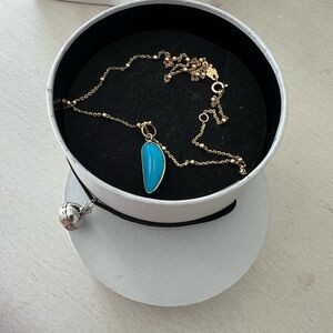 Tous Gold Necklace with Vibrant Blue Pendant